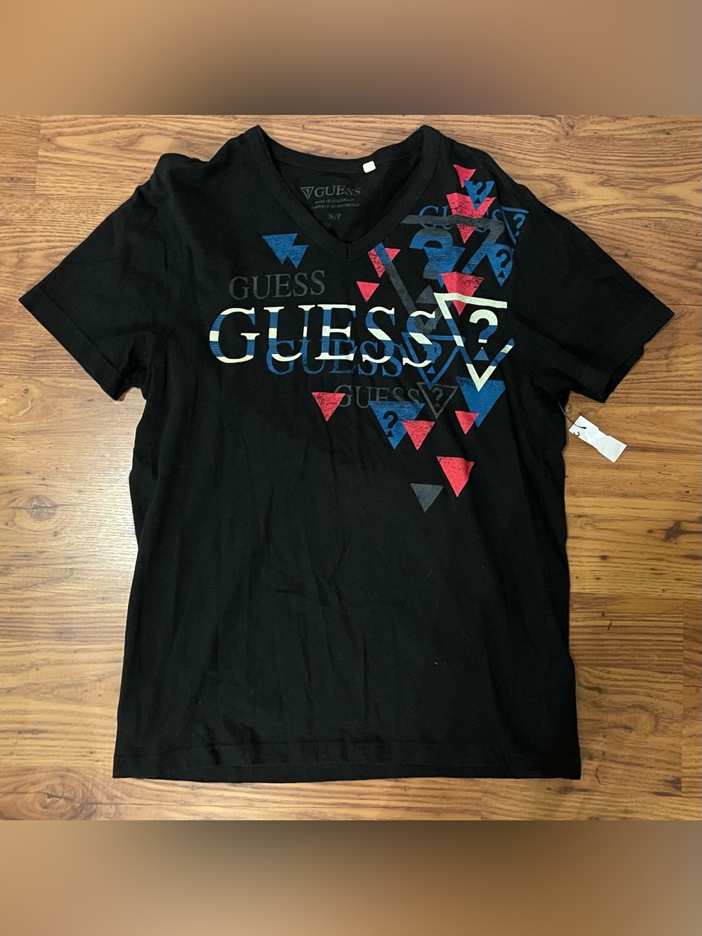 GUESS Black V‑Neck Graphic Tee with Blue & Red Accents